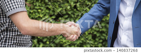 Banner Trust honesty business customer handshake together promise partner. Panorama Businessman teamwork diversity solidarity team Partner hands together. Team meeting shaking hands with copy space 140837268