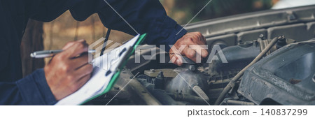 Banner Man hands fixing Car machinery vehicle mechanical service. Mechanic man hands repairing car shop. panoramaopen vehicle hood checking up auto mobile. Car maintenance engineer with copy sapce. 140837299