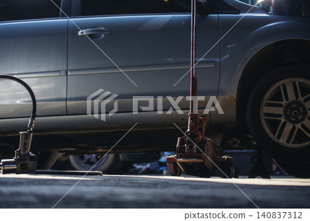 Mechanic tools engineering equipment car auto repair shop with copy space. Blurred background mechanical service. Heavy screw grungy rusted wrenches dirty screwdriver object. Industrial hardware set Mechanic tools engineering equipment car auto repair shop with copy space. Blurred background mechanical service. Heavy screw grungy rusted wrenches dirty screwdriver object. Industrial hardware set 140837312
