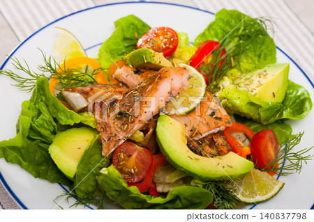 Salad of grilled trout, avocado, tomatoes, bell pepper Salad of grilled trout, avocado, tomatoes, bell pepper 140837798