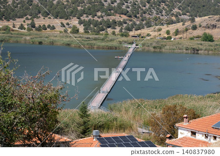 Pontoon pedestrian bridge on Lake Malaya Prespa in Greece Pontoon pedestrian bridge on Lake Malaya Prespa in Greece 140837980