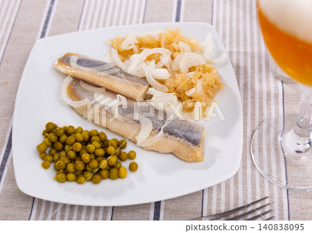 Light salted herring with marinated cabbage and green peas Light salted herring with marinated cabbage and green peas 140838095