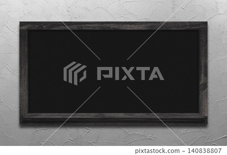 A black-framed blackboard with shelves and a troweled white wall background. A black-framed blackboard with shelves and a troweled white wall background. 140838807