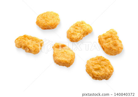 Nestled on a clean surface, delicious nuggets display their appetizing golden hue, PNG Nestled on a clean surface, delicious nuggets display their appetizing golden hue, PNG 140840372