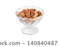 Nuts in glass containers 140840487