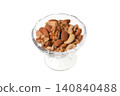Nuts in glass containers 140840488