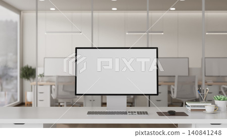 Modern desktop computer mockup on stylish office desk with bookshelf Modern desktop computer mockup on stylish office desk with bookshelf 140841248