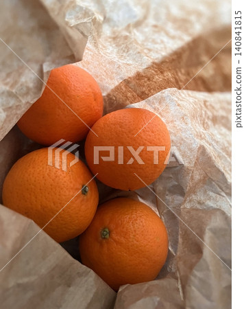 Mandarin oranges, vibrant and juicy citrus fruits with easy-to-peel skin, arranged beautifully. Perfect for snacking, garnishing, or adding a burst of freshness to any dish. Mandarin oranges, vibrant and juicy citrus fruits with easy-to-peel skin, arranged beautifully. Perfect for snacking, garnishing, or adding a burst of freshness to any dish. 140841815