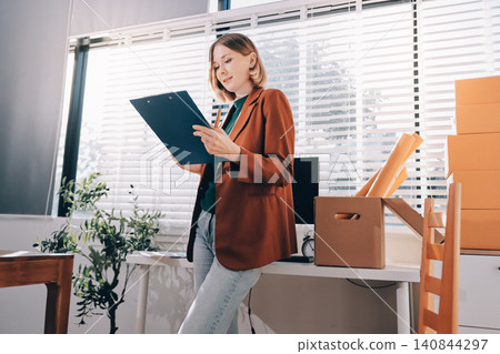 Fashion designer woman and typing on laptop in shop for email project or online order of fabric in creative startup Serious tailor computer and small business for clothes or textile in : Generative AI Fashion designer woman and typing on laptop in shop for email project or online order of fabric in creative startup Serious tailor computer and small business for clothes or textile in : Generative AI 140844297