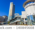 A scene in front of Takamatsu Station in Kagawa Prefecture, Japan, where there is a train station and a port. 140845608