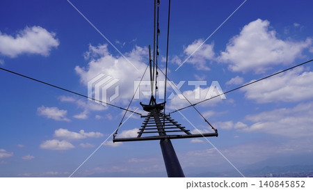 Sky Lift Tower with Clouds and Blue Sky View Sky Lift Tower with Clouds and Blue Sky View 140845852