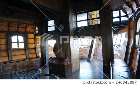 Interior of a Themed Structure with Wooden Design Elements 140845897