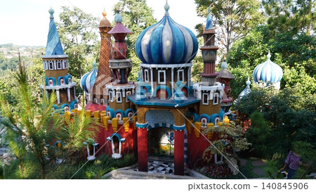 Colorful Castle Inspired by Fantasy Architecture Amidst Greenery Colorful Castle Inspired by Fantasy Architecture Amidst Greenery 140845906
