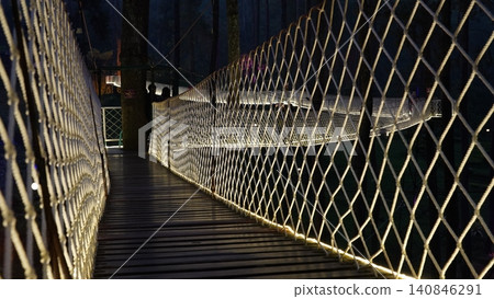 Hanging Rope Bridge Walkway at Night Adventure Tourism 140846291