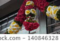 Decorative Rose Garland Red Yellow and White Blooms 140846328