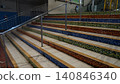 Colorful Stairs Leading to an Escalator Structure 140846340