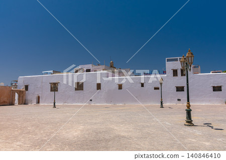 Traditional lanterns decorate a wide esplanade with whitewashed walls at the Kasbah of Rabat, Morocco. Traditional lanterns decorate a wide esplanade with whitewashed walls at the Kasbah of Rabat, Morocco. 140846410