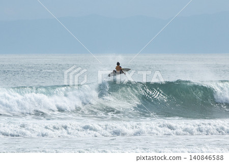 Shonan Kugenuma Beach: Surfers executing tricks Shonan Kugenuma Beach: Surfers executing tricks 140846588