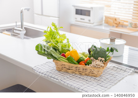 A basket of vegetables placed in the kitchen A basket of vegetables placed in the kitchen 140846950
