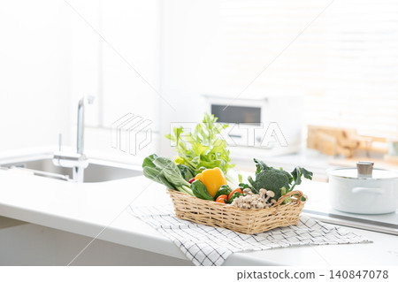 A basket of vegetables placed in the kitchen A basket of vegetables placed in the kitchen 140847078