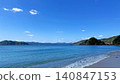 The emerald green sea and white sandy beach of Yadori Beach in Setouchi Town, Amami Oshima. 140847153