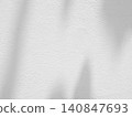 Abstract shadow of leaves on white concrete wall background 140847693