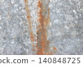 Galvanized sheet metal with signs of corrosion, brown rust is visible, close-up 140848725