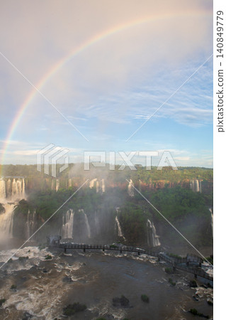 Majestic rainbow over breathtaking iguazu falls landscape in wild nature Majestic rainbow over breathtaking iguazu falls landscape in wild nature 140849779