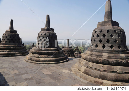 Borobudur Temple, Yogyakarta, Java, Indonesia - World Heritage Site - One of the world's three greatest Buddhist sites Borobudur Temple, Yogyakarta, Java, Indonesia - World Heritage Site - One of the world's three greatest Buddhist sites 140850074