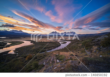 Patagonia mountain river valley at sunset with pink sky 140850192