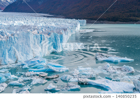 Perito Moreno glaciers blue ice wall floating ice cold lake mountain landscape frozen water glacial cliff Argentina view serene winter scene Perito Moreno glaciers blue ice wall floating ice cold lake mountain landscape frozen water glacial cliff Argentina view serene winter scene 140850235