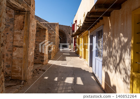 Spinalonga Island Abandoned Street with Colorful Building Facades Spinalonga Island Abandoned Street with Colorful Building Facades 140852264