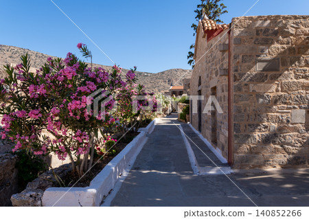 Blooming Pink Oleander Flowers on Spinalonga Island Street Crete Blooming Pink Oleander Flowers on Spinalonga Island Street Crete 140852266
