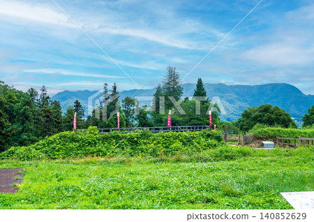 The lush, green historical landscape of the Nagurumi Castle ruins in Minakami Town, Gunma Prefecture 140852629