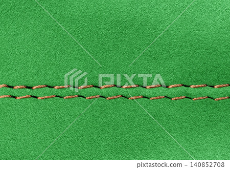 Elegant warm Green suede surface with decorative stitch for design Elegant warm Green suede surface with decorative stitch for design 140852708