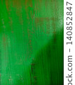 Weathered Wood Surface and Rustic Brush Stroke Pattern 140852847