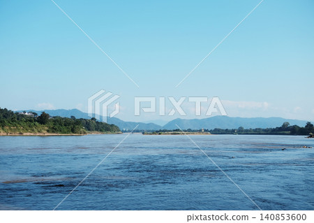 Beautiful of the Mekong river forms the border between Thailand and Laos with blue sky. Beautiful of the Mekong river forms the border between Thailand and Laos with blue sky. 140853600