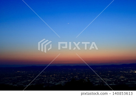 Scattered village and crescent moon Scattered village and crescent moon 140853613