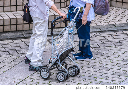A casual chat about the urban landscape of Yokohama, Japan... On a hot and humid day during the rainy season... Elderly women standing and chatting for a long time = Yokohama City A casual chat about the urban landscape of Yokohama, Japan... On a hot and humid day during the rainy season... Elderly women standing and chatting for a long time = Yokohama City 140853679