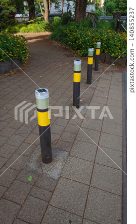 Bollards installed at equal intervals along the walking path Bollards installed at equal intervals along the walking path 140855237