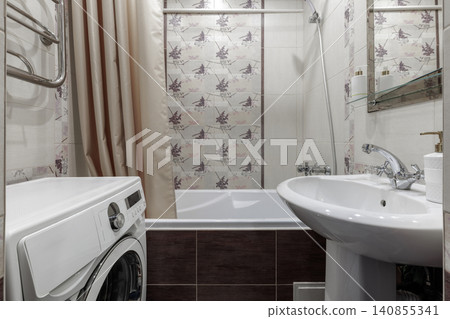 Bathroom Interior with Washing Machine Bathtub and Ceramic Sink Bathroom Interior with Washing Machine Bathtub and Ceramic Sink 140855341