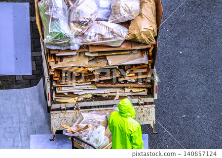 Apartment renovation in Yokohama, Japan. Waste materials are being loaded onto trucks one after another. (Yokohama city) Apartment renovation in Yokohama, Japan. Waste materials are being loaded onto trucks one after another. (Yokohama city) 140857124