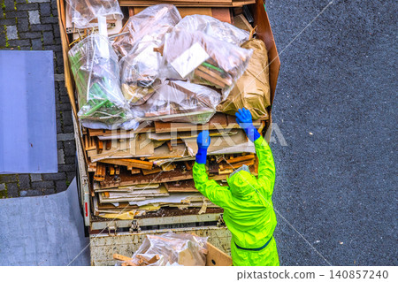 Apartment renovation in Yokohama, Japan. Waste materials are being loaded onto trucks one after another. (Yokohama city) Apartment renovation in Yokohama, Japan. Waste materials are being loaded onto trucks one after another. (Yokohama city) 140857240