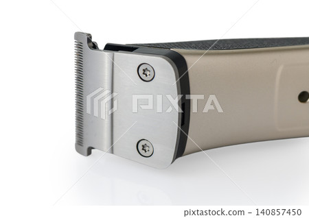 Professional Gold Hair Trimmer with T-Blade Isolated on White Background Professional Gold Hair Trimmer with T-Blade Isolated on White Background 140857450