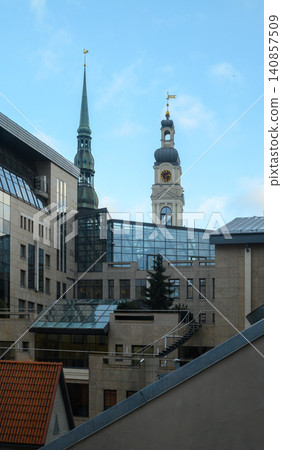 Riga Town Hall with Bell Tower and St. Peter Church Spire, Riga Old Town, Latvia Riga Town Hall with Bell Tower and St. Peter Church Spire, Riga Old Town, Latvia 140857509