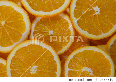 Fresh Orange Slices on Rustic Table Background Fresh Orange Slices on Rustic Table Background 140857510