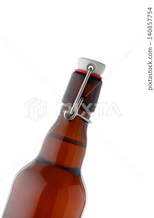 Clear Liquid in Dark Glass Swing Top Bottle Close Up 140857754