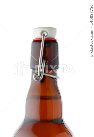 Brown Glass Swing Top Bottle Close Up Isolated on White Brown Glass Swing Top Bottle Close Up Isolated on White 140857756