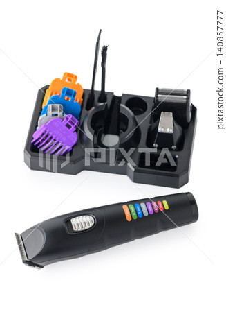 Multifunctional Hair and Beard Trimmer Set with Colorful Attachments Isolated on White Multifunctional Hair and Beard Trimmer Set with Colorful Attachments Isolated on White 140857777