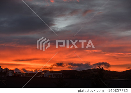 Intense Sunset with Purple and Red Hues Over Tbilisi Mountain Ridges Intense Sunset with Purple and Red Hues Over Tbilisi Mountain Ridges 140857785